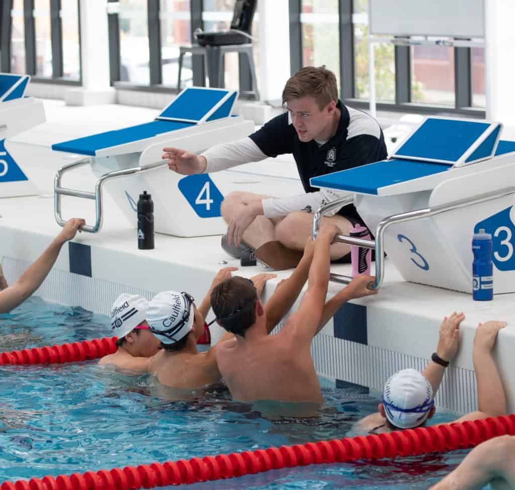 Secondary students participating in swimming at Caulfield Grammar School
