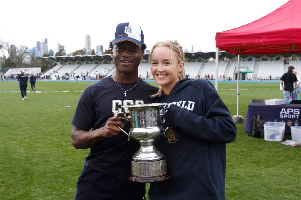 Caulfield Grammar School Year 12 Athletics Captains holding trophy at APS 2022