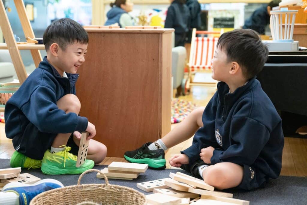 Kindergarten students learning together in the classroom